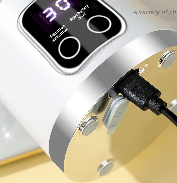 Close-up of the Tumbla Go base with the display and a Type-C charging cable connected