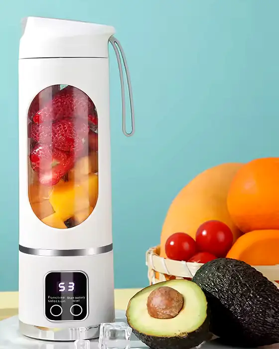 Tumbla Go Portable Blender in White with fresh fruit